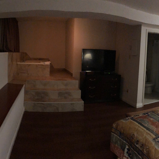 Big room with king bed and jacuzzi